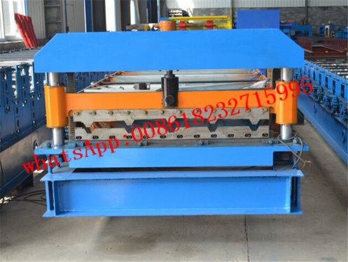 Metal roof panel forming machine